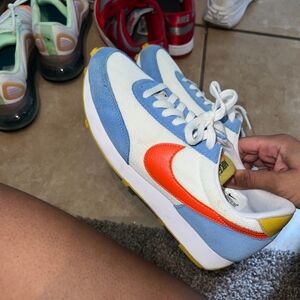 Nike Womens White, Blue, and Orange Sneakers